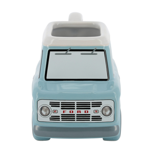 front of a light blue vintage Bronco shaped ceramic car mug on a white background 