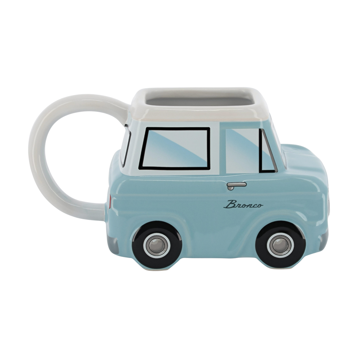 light blue vintage Bronco shaped ceramic car mug on a white background