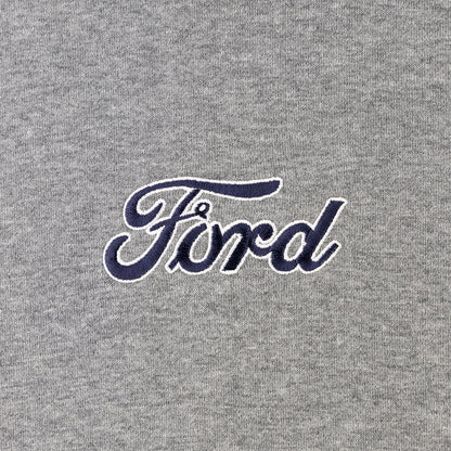 navy blue ford script text on a gray background