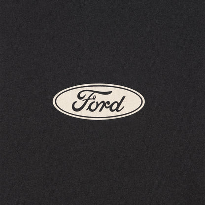 white Ford oval logo on a black background