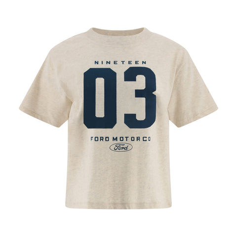 A light beige heathered t-shirt featuring a navy blue graphic print on the front with the text 'NINETEEN 03 FORD MOTOR CO' and the Ford logo.