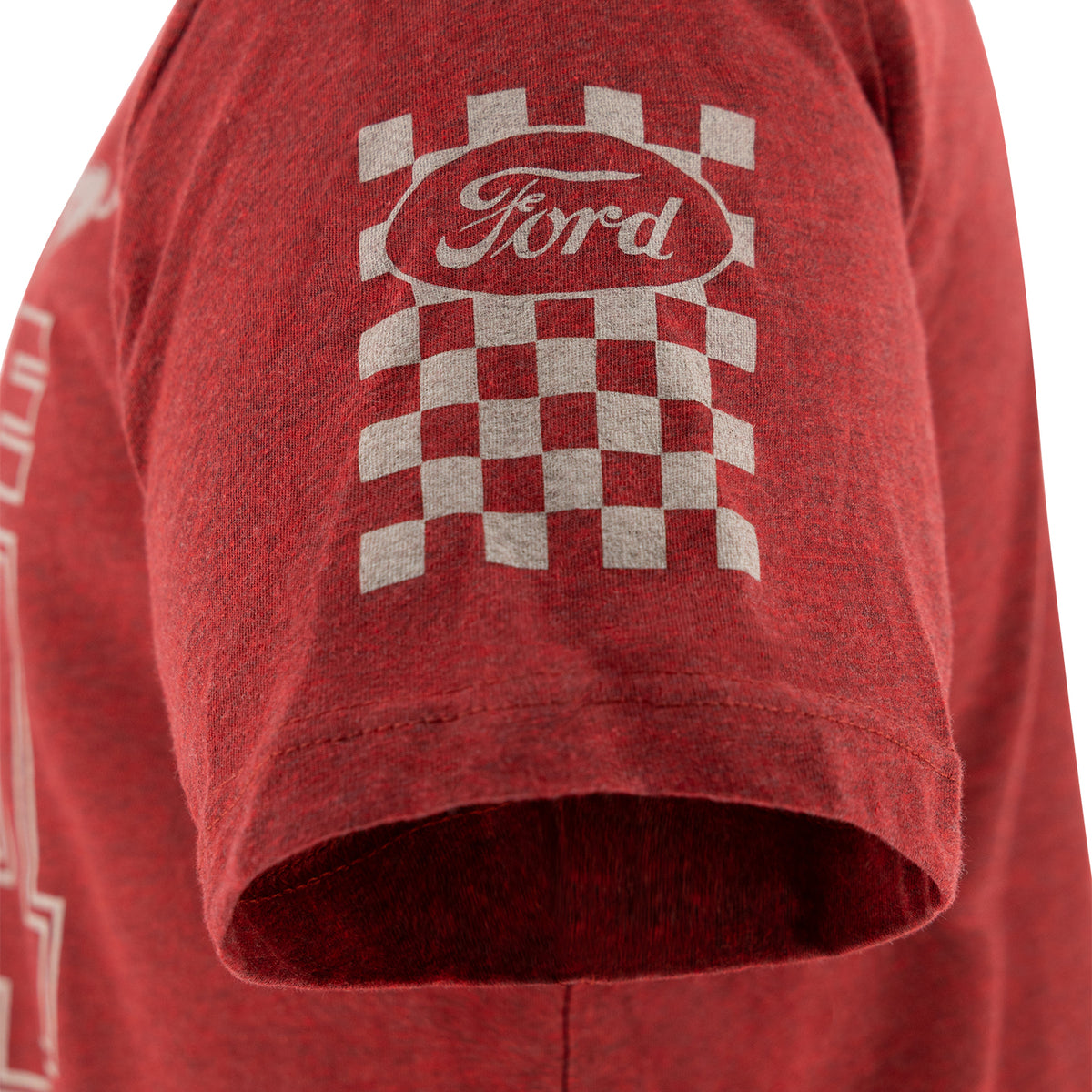Close-up of a heather red short-sleeve T-shirt with a white Ford logo and checkered square graphic printed on the upper sleeve.