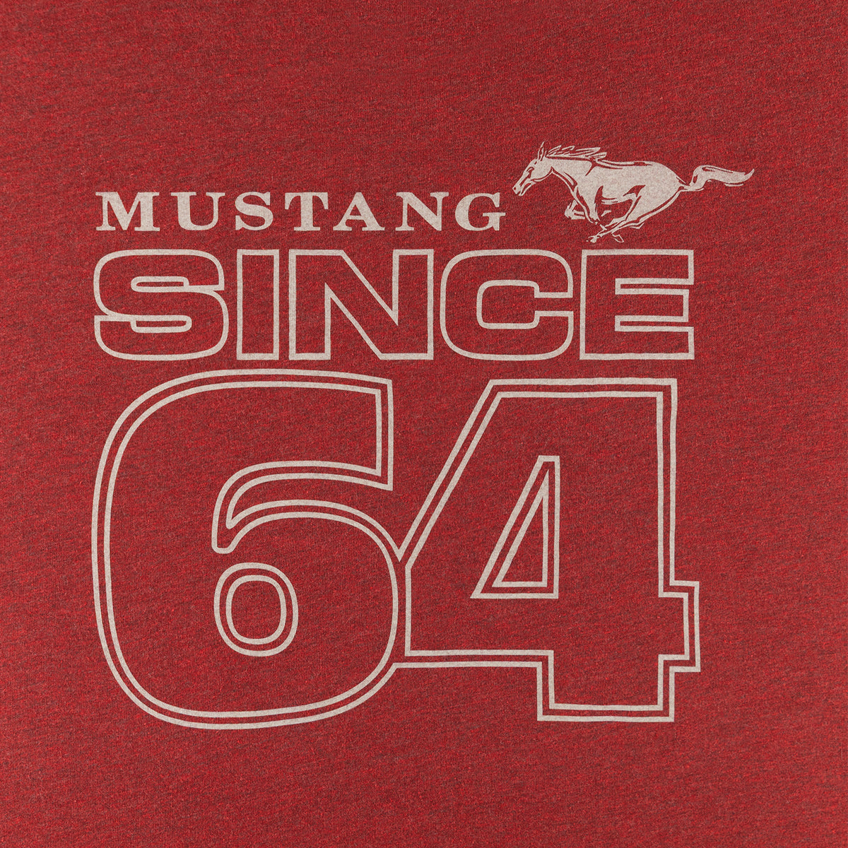 A close-up of a red heathered fabric surface with a white outlined graphic reading “MUSTANG SINCE 64” and a small running horse emblem above the text.