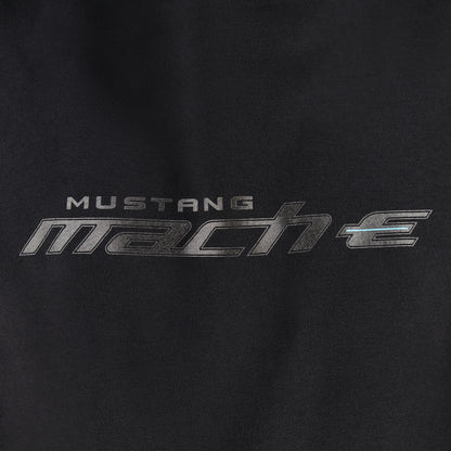 close up of Mustang mach-e logo text on a black background