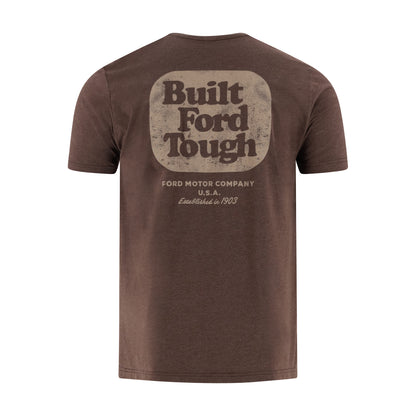 A brown short-sleeve t-shirt shown from the back, featuring a distressed beige graphic that reads 'Built Ford Tough' with 'FORD MOTOR COMPANY U.S.