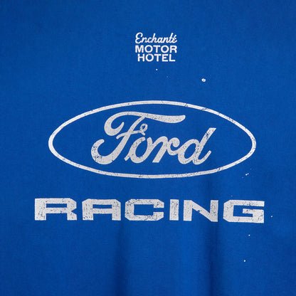 back of a Ford Racing blue crewneck with enchante motor hotel text on a white background