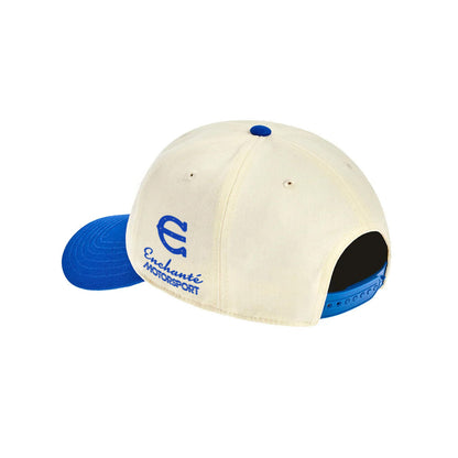 cream hat with Enchante motorsport embroidery and a snapback on a white background
