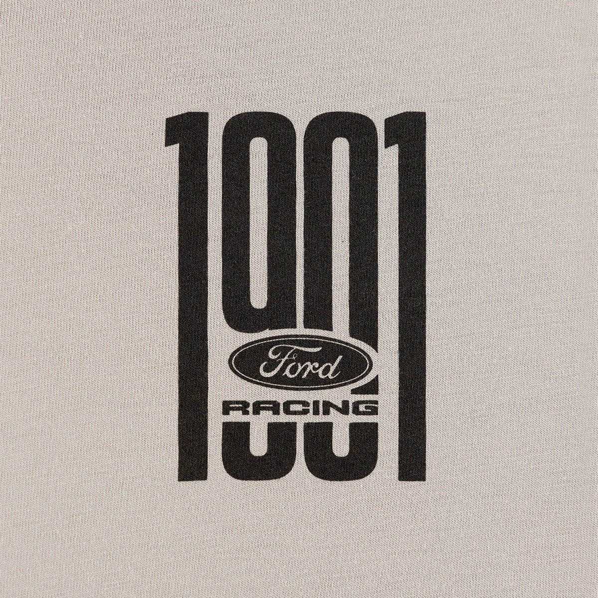 close up of black 1901 Ford Racing text on a gray background