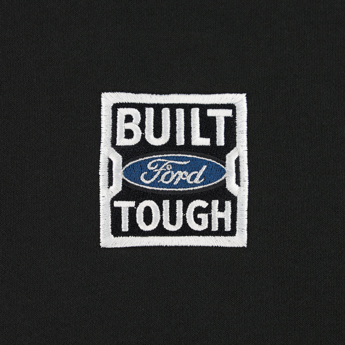 close up of a Built Ford Tough logo on a black background