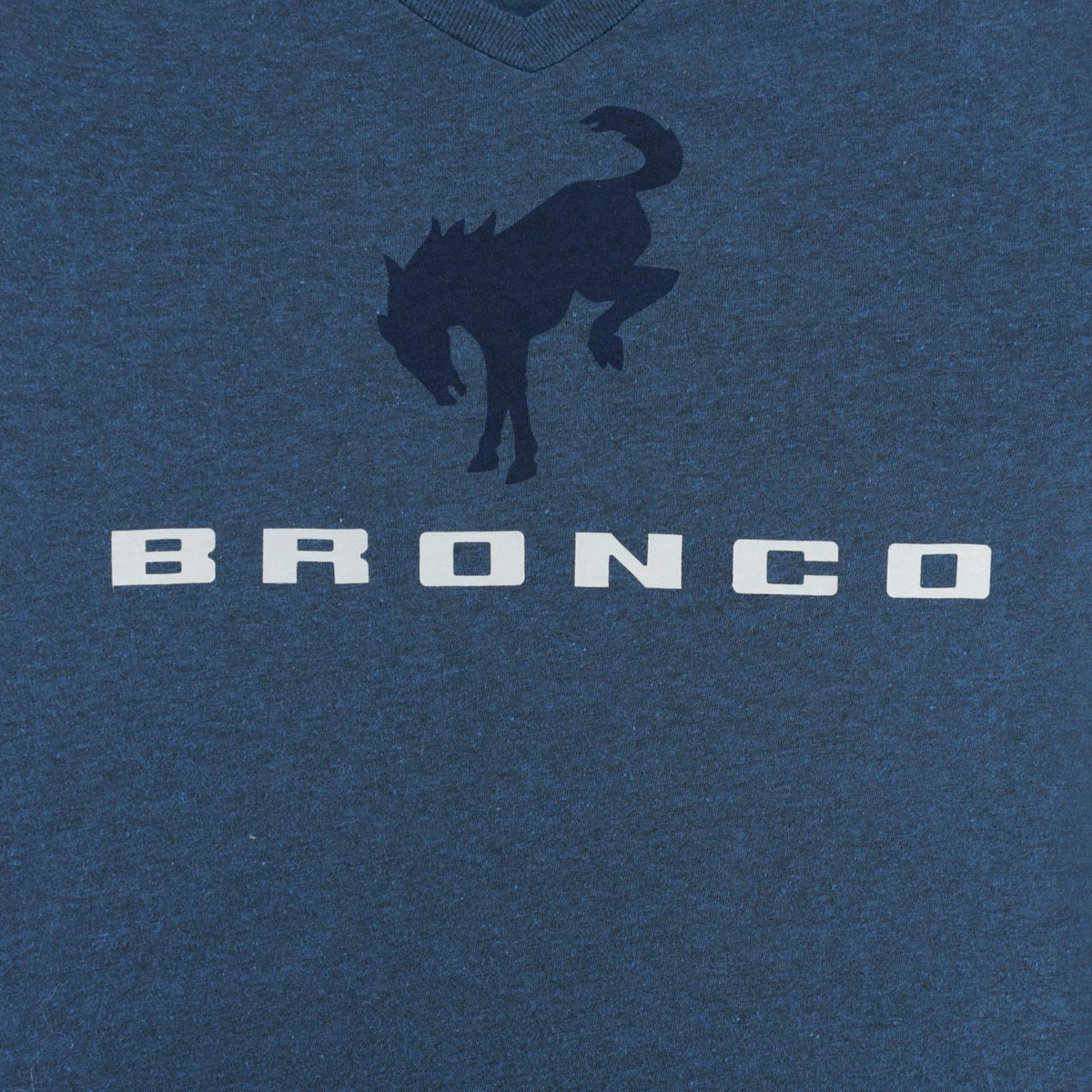 Blue shirt with bronco logo and text