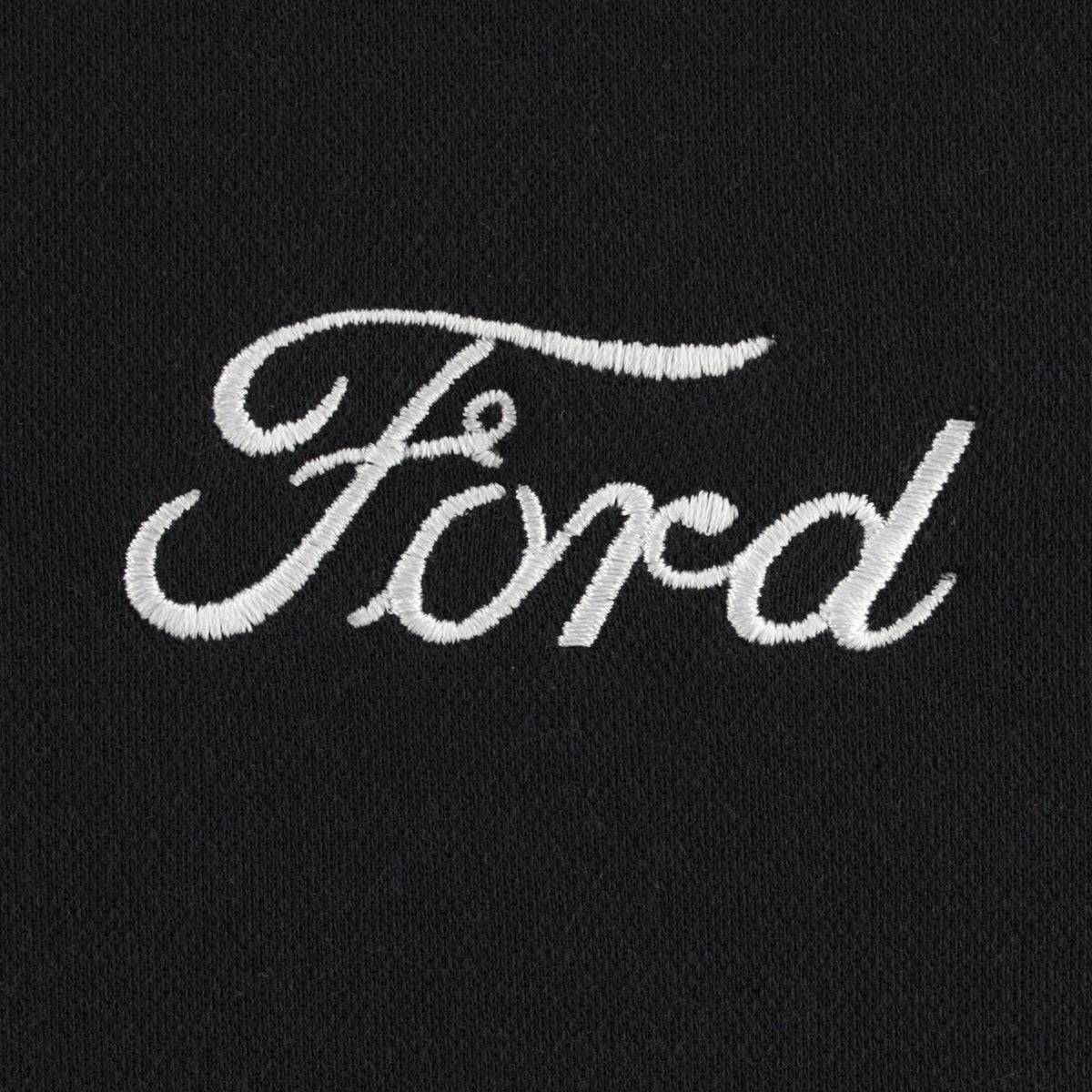 Embroidered Ford logo on a black background