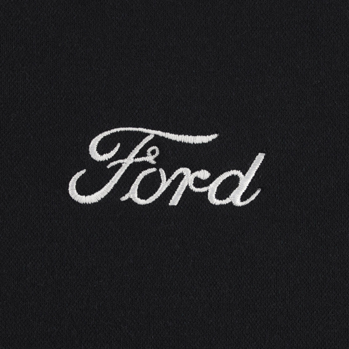 white ford script on black background