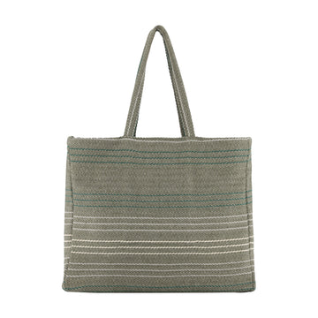 A woven tote bag in a muted sage green color, featuring thin horizontal stripes in white and teal, with two top handles, shown against a plain white background.