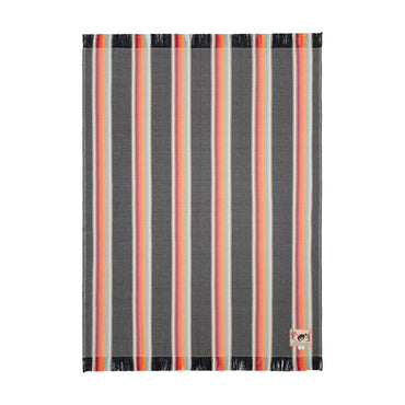 Striped blanket with black, orange, and gray stripes on a white background