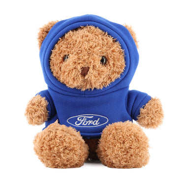 Plush teddy bear wearing a blue hoodie with Ford logo on a white background