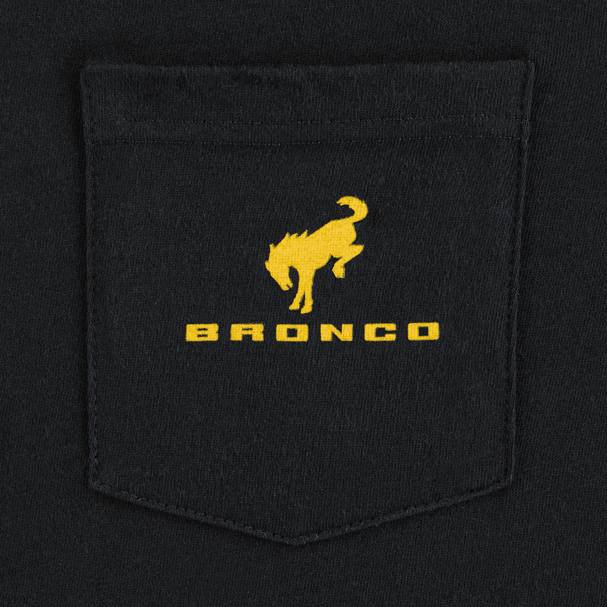close up of a pocket with yellow bronco text