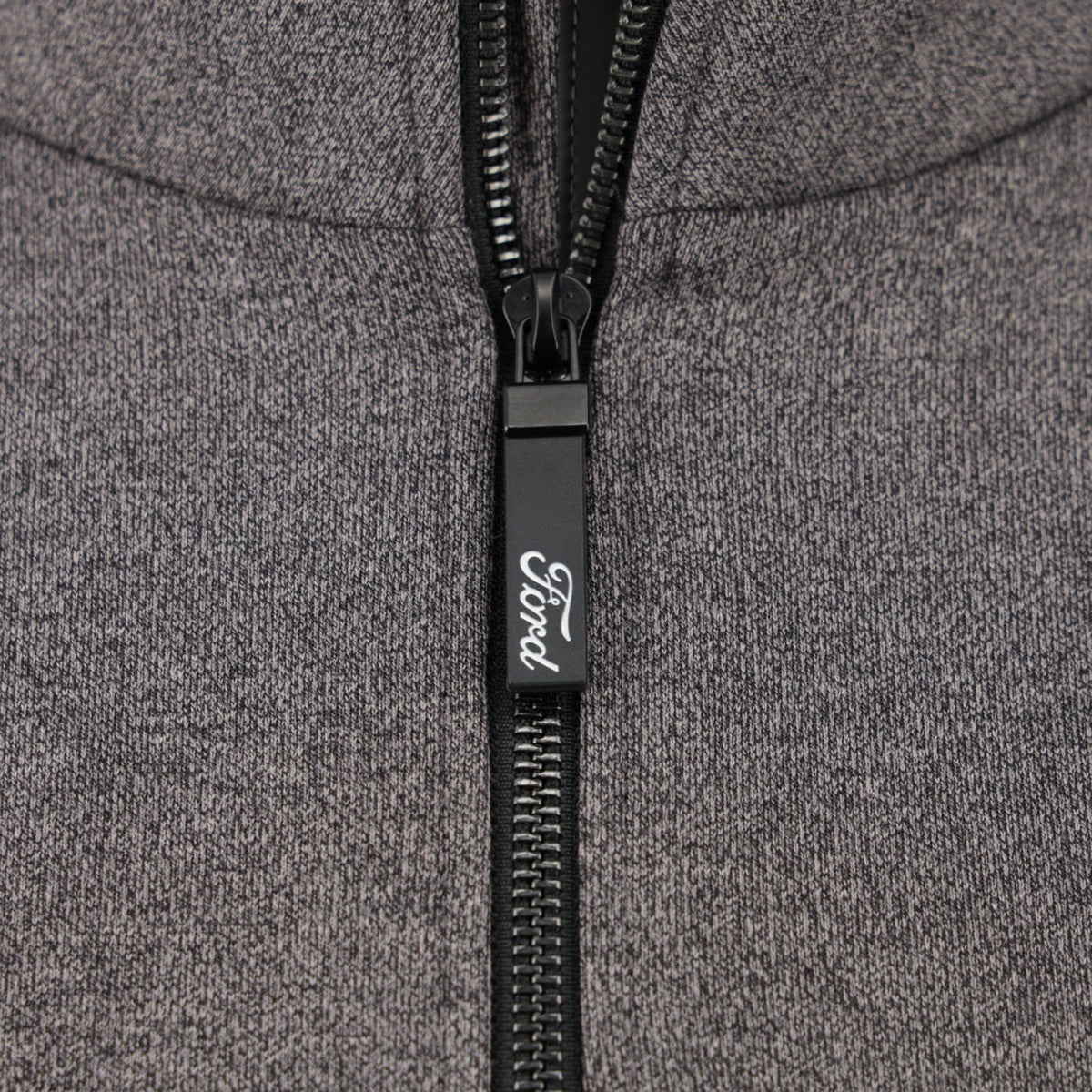 close up of a Ford script zipper ona grey sweatshirt