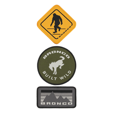 A set of three patches with Bronco iconography and a Sasquatch patch.
