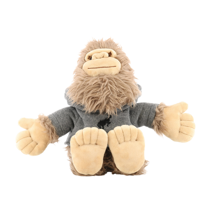 Plush toy resembling a sasquatch with a gray hoodie on a white background