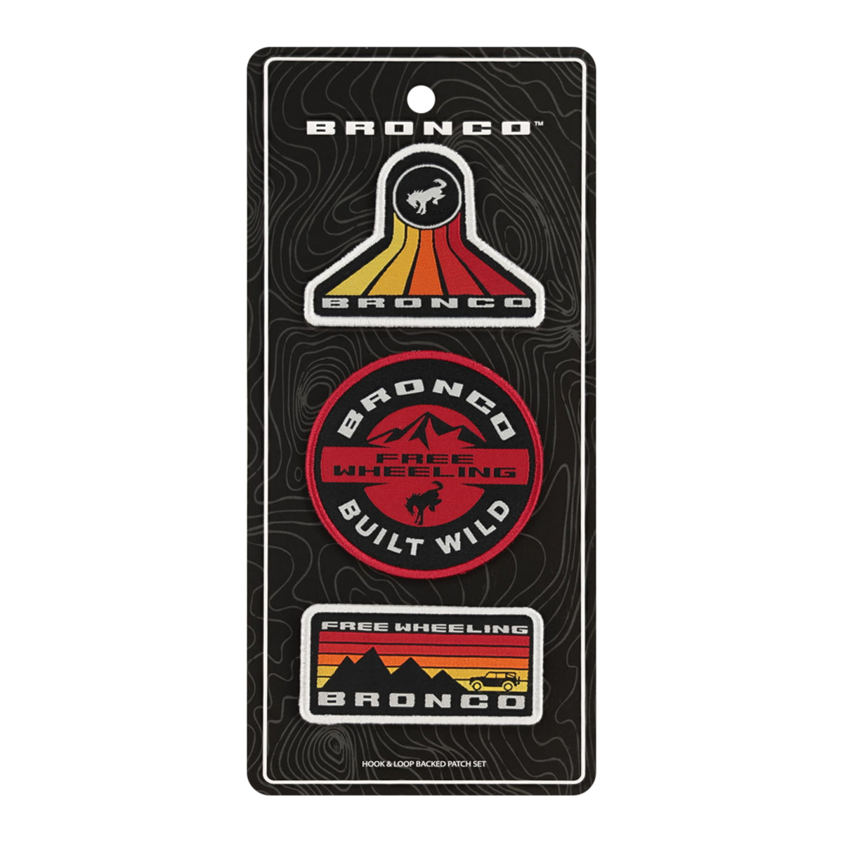 A set of three Ford Bronco patches with varying designs, mounted on a display card. The patches feature the Bronco logo and the phrases 'Built Wild' and 'Free Wheeling'.