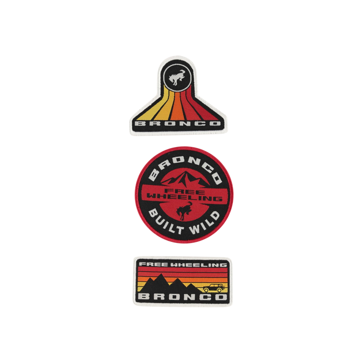 A set of three Ford Bronco patches with varying designs, mounted on a display card. The patches feature the Bronco logo and the phrases 'Built Wild' and 'Free Wheeling'.