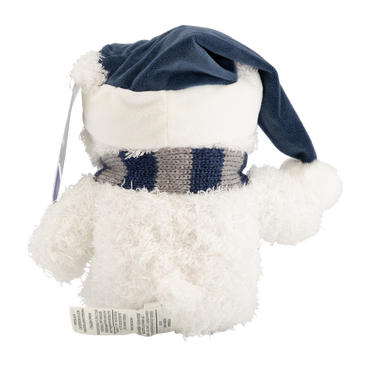 White plush teddy bear with a blue hat and scarf on a white background