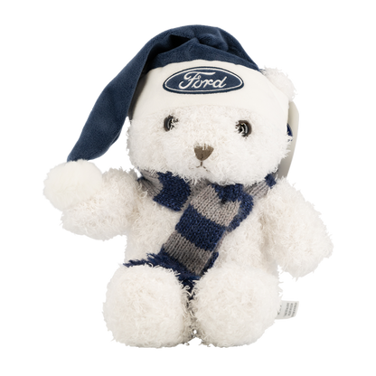 white teddy bear with blue ford oval on blue santa hat with a gray and blue knit scarf