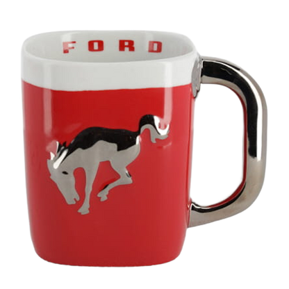A red and white coffee mug with 'Bronco' text on the side.