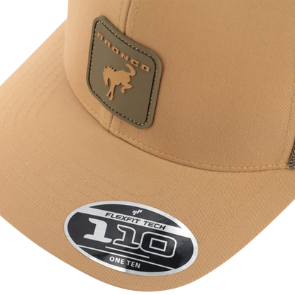 Beige cap with Bronco logo and Flexfit Tech label on a white background