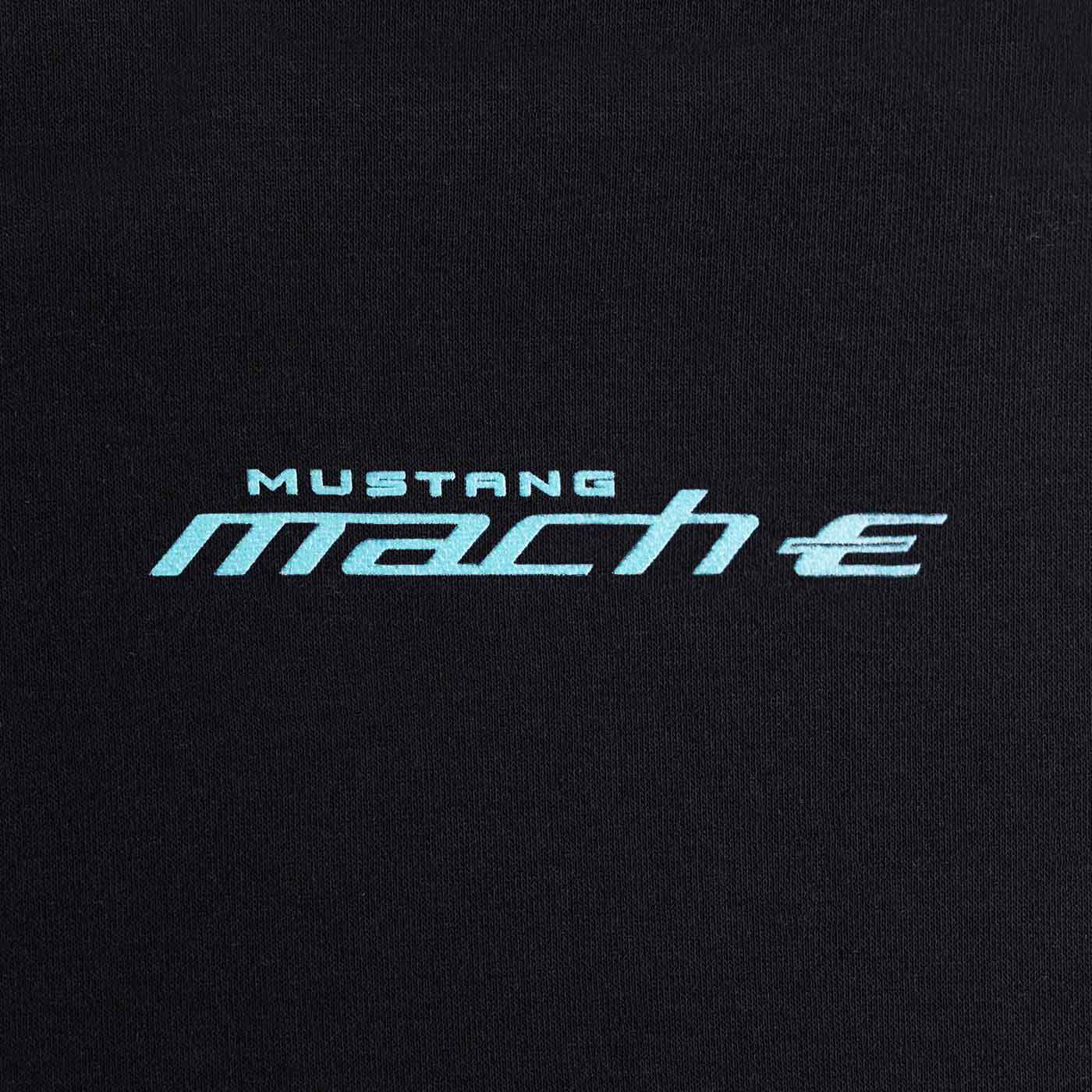 Black shirt with 'Mustang Mach-E' text in white and light blue on a black background
