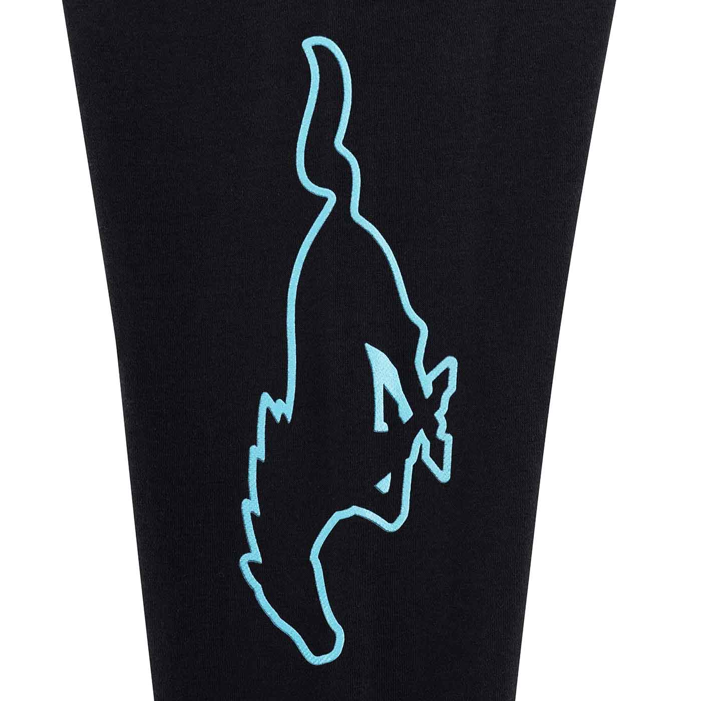 Black leggings with a light blue outline of a fish design on a white background