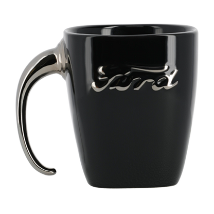 Black mug with a silver handle and logo on a white background