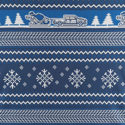 Navy blue fabric with white Christmas-themed patterns including a sleigh, trees, and snowflakes.