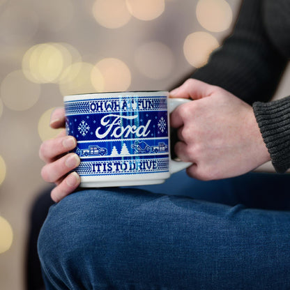 person holding a blue and white sweater patterned mug with Oh what fun is is to drive and Ford text