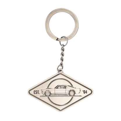 Keychain with car design and 'EST. '64' text on a white background