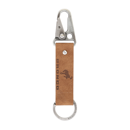 Keychain with brown leather strap and silver carabiner on a white background