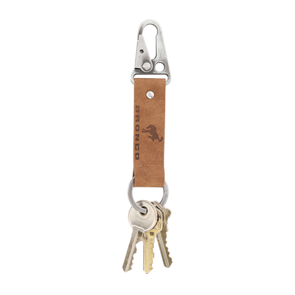 Keychain with leather strap and carabiner on a white background