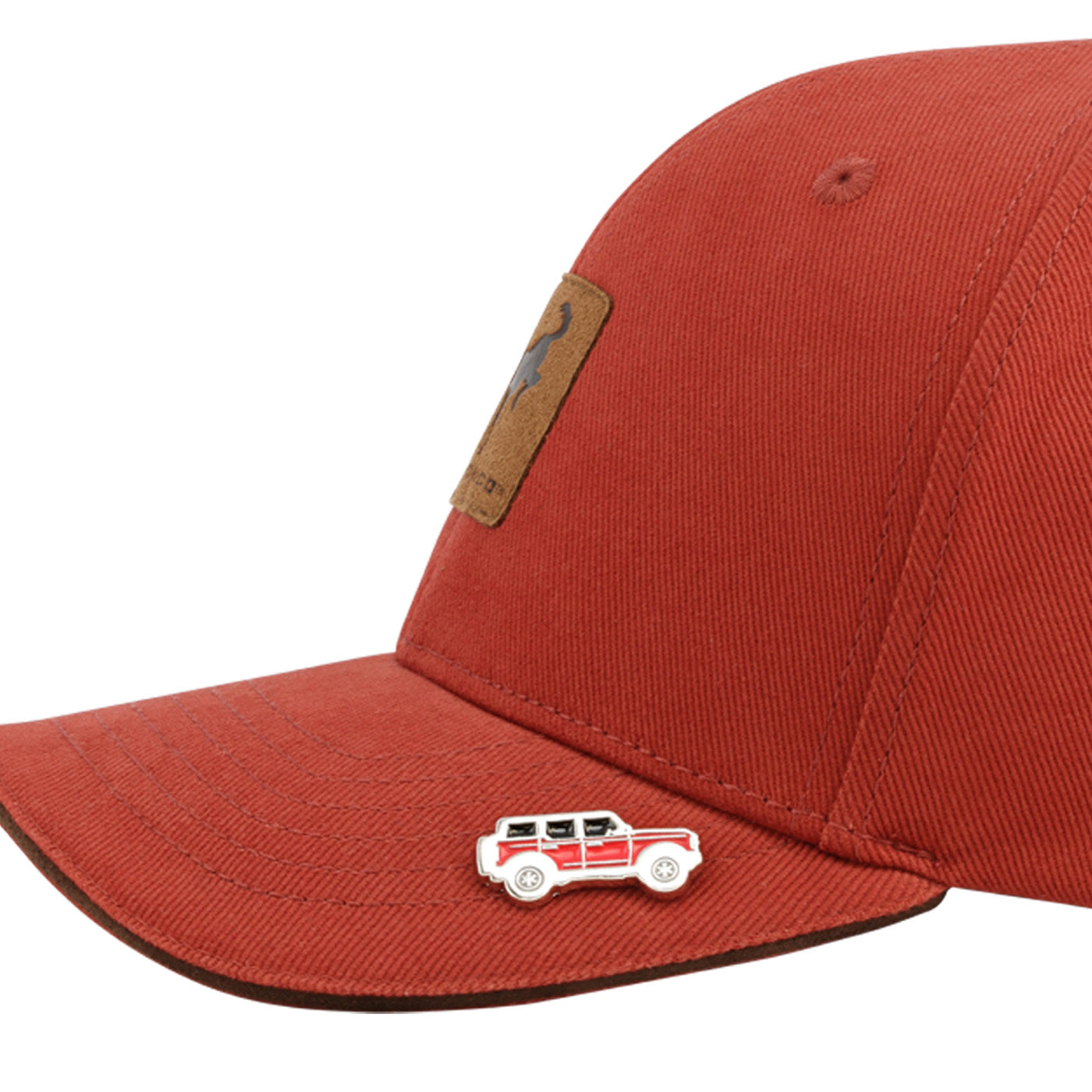 Red cap with a small car emblem on a white background
