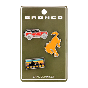 Bronco enamel pin set on a green card with a bronco logo.