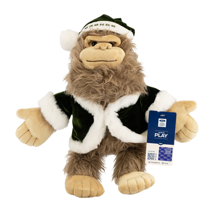Plush toy resembling a character from a sports team, with a tag on a white background