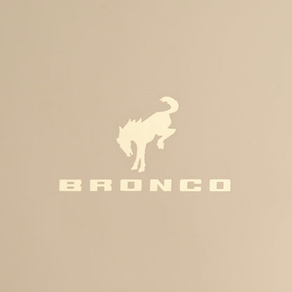 Bronco logo with a horse silhouette on a beige background