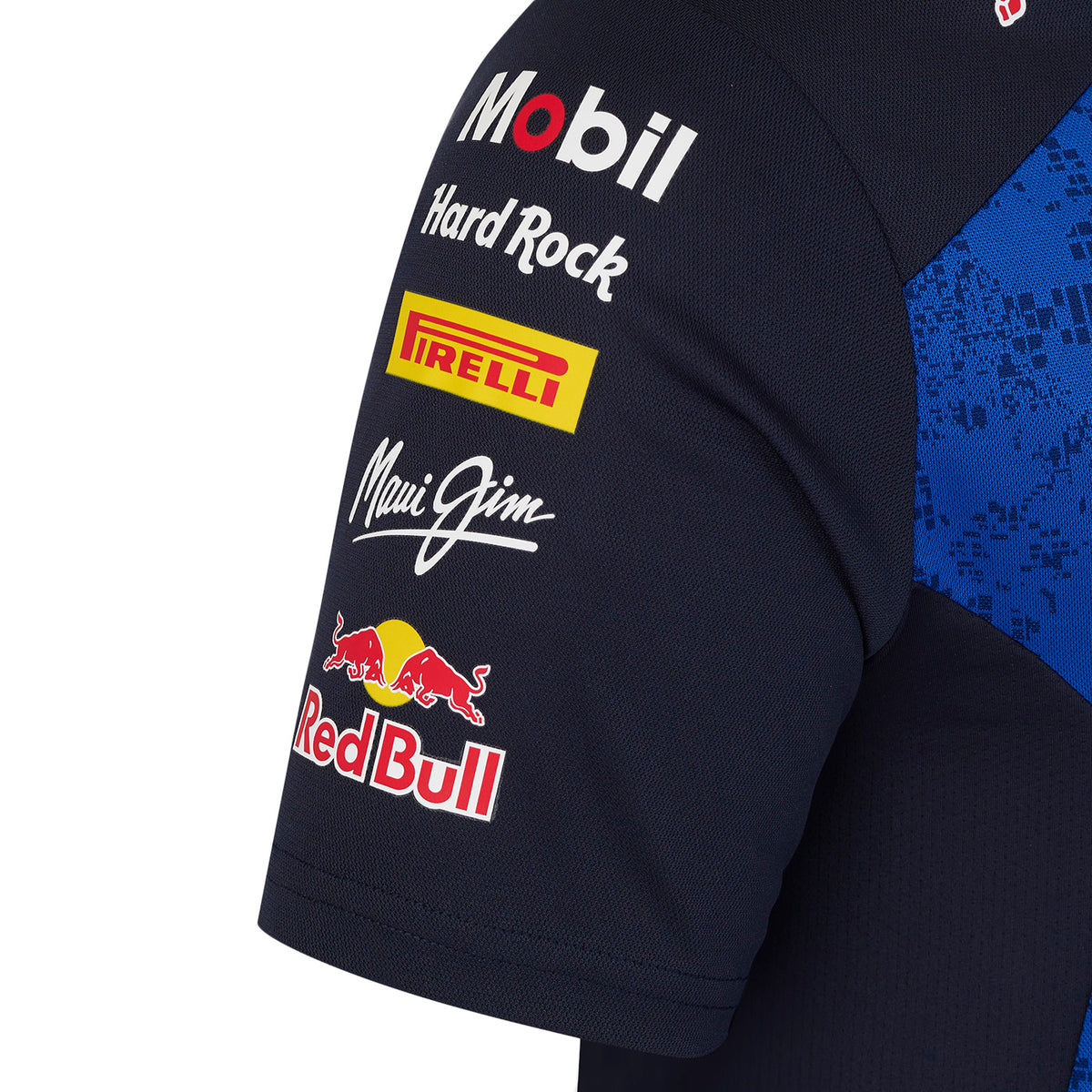 Close-up of a black sleeve with various brand logos including Mobil, Hard Rock, Pirelli, and Red Bull.