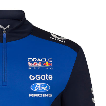 Blue and black jacket with Oracle Red Bull Racing, Gate, and Ford Racing logos on a white background