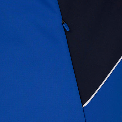 Close-up of a blue and black jacket with a zipper detail.