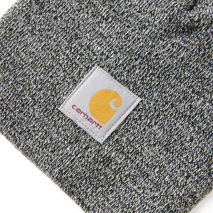Close-up of a Carhartt label on a textured fabric background