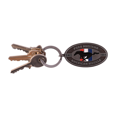 silver ford mustang keychain with tribar logo and since 1964, American Muscle text. with key ring and keys