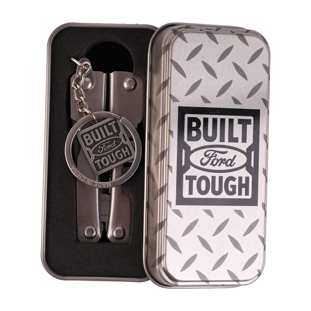 Multitool keychain with 'Built Ford Tough' tag in a branded tin box.