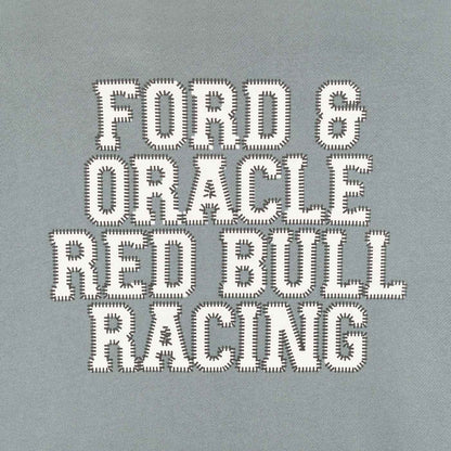 Text 'FORD & ORACLE RED BULL RACING' on a gray background