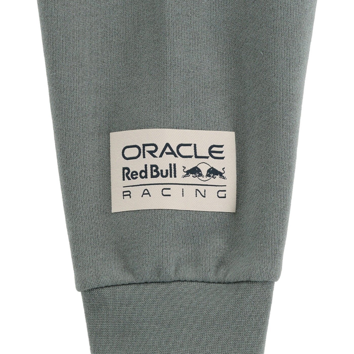 Gray sweatpants with Oracle Red Bull Racing logo on a white background