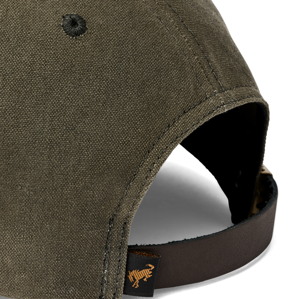 close up of a green hat with a brown leather strap and a brono tag